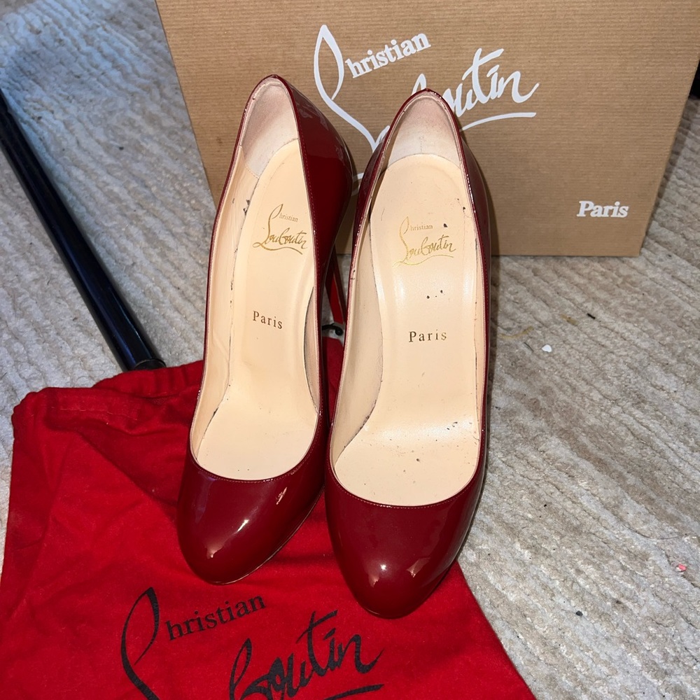 Christian Louboutin Rounded Toe Red Pumps